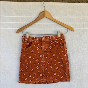 Girls orange floral corduroy mini skirt